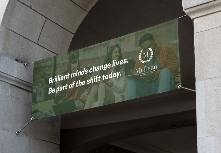 University vinyl banner hanging outdoors