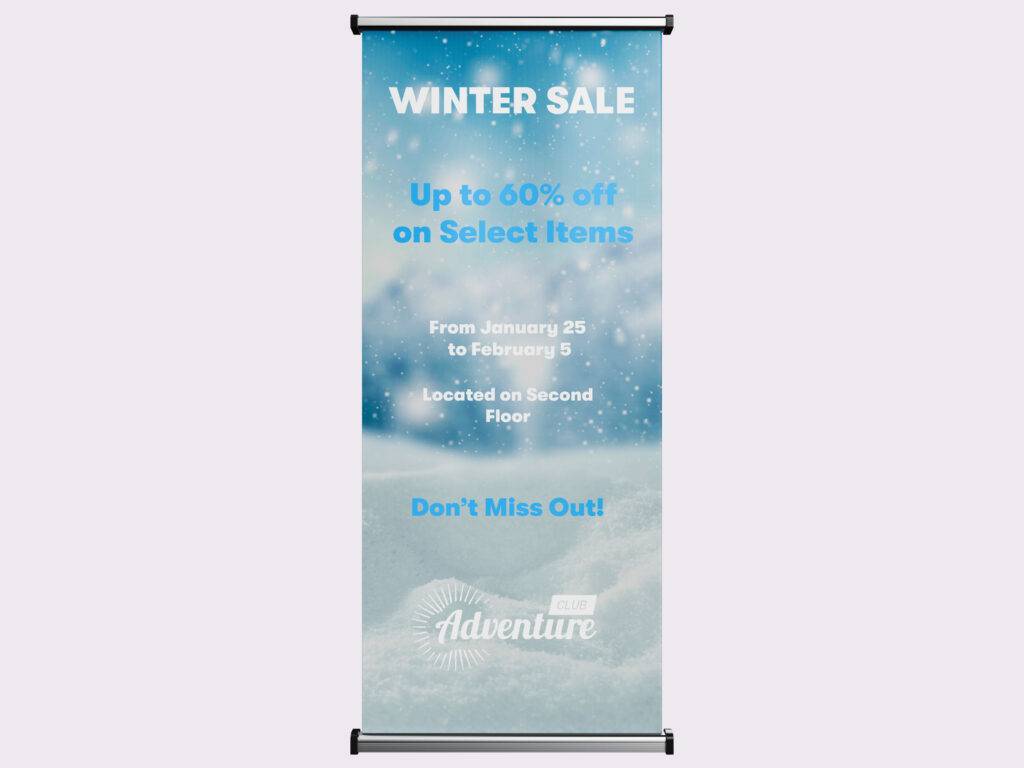 Vibrant winter roll-up banner for retail, highlighting winter sales with eye-catching print materials.